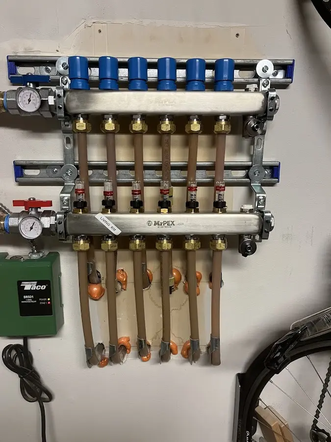 Plumber performing Water Heater Repair at a residential property in New Albany